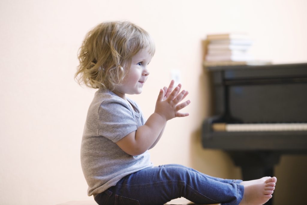 Toddler girl praying